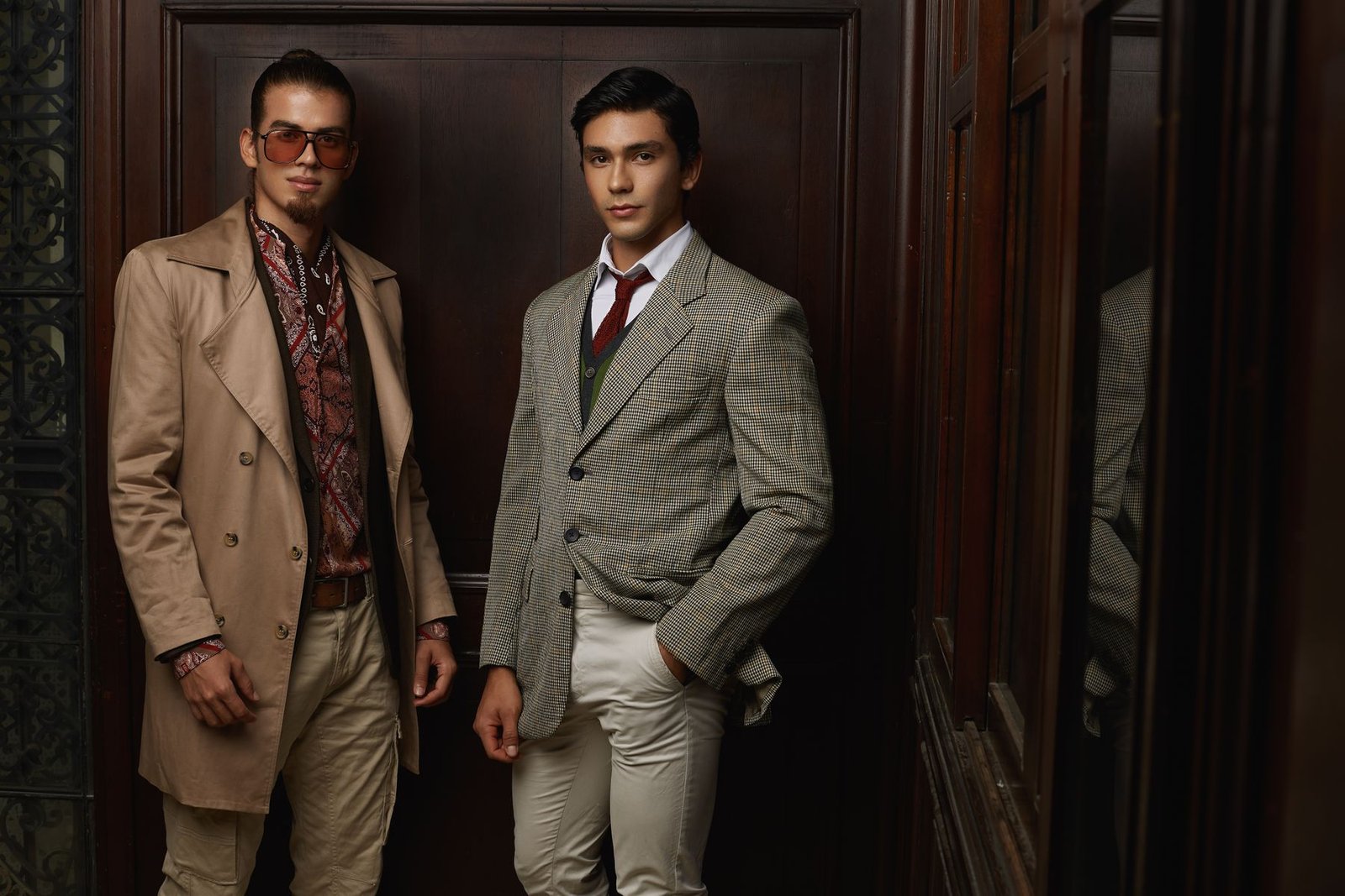 Men in modern tailored looks inside a studio